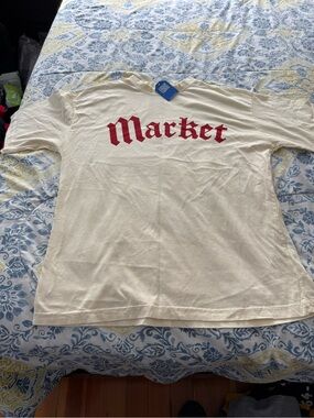 Market Studios Men’s Market Logo Cream Short-Sleeve Tee with Red Script